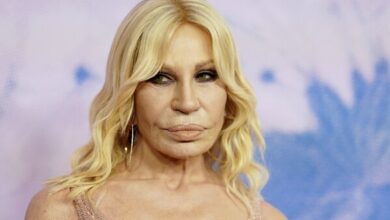 Donatella Versace out as creative director of the Milan fashion house, in a  shakeup by US owner | AP News