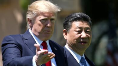 President Donald Trump (L) and Chinas President Xi Jinping chat as they walk along the front patio of the Mar-a-Lago estate after a bilateral meeting in Palm Beach, Florida. — Reuters