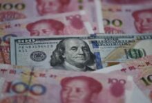China rolls out plan to promote its own payment system as US trade war simmers