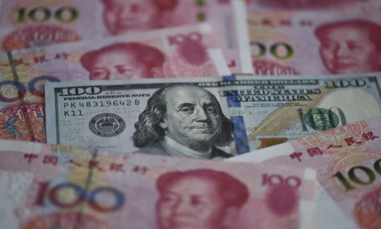 China rolls out plan to promote its own payment system as US trade war simmers