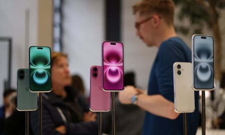 iPhones are displayed at a store in London. Photo: Reuters