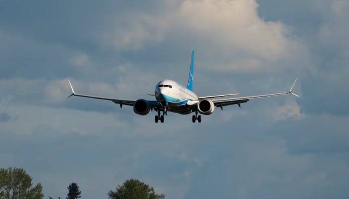 A Boeing 737 MAX 8, the second jet intended for use by a Chinese airline to be returned to its manufacturer, lands at Boeing Field, as trade tensions escalate over US tariffs with China, in Seattle, Washington, US, on April 22, 2025. —Reuters