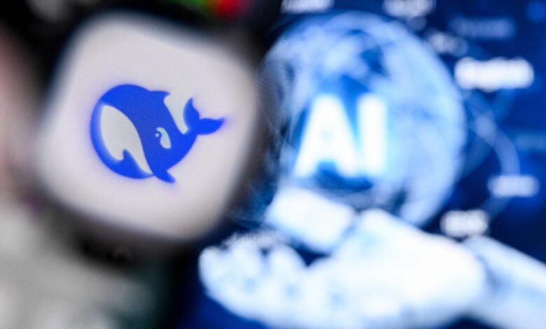 The letters ‘AI’ are shown on a laptop screen next to the logo of DeepSeek. Photo: AFP
