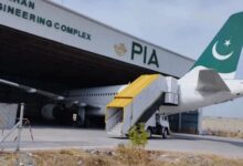 This picture, released on February 9, 2023, shows a Pakistan International Airlines (PIA) aircraft parked inside a shade in Nur Khan Engineering Complex in Islamabad. — X/@PIA