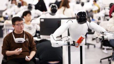 Staff members train humanoid robots at AgiBot’s data collection centre in Shanghai. Photo: China News Service/VCG via Getty Images