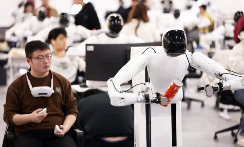Staff members train humanoid robots at AgiBot’s data collection centre in Shanghai. Photo: China News Service/VCG via Getty Images