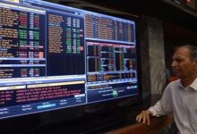 A trader monitors electronic trading board on the floor of Pakistan Stock Exchange. — Reuters/File