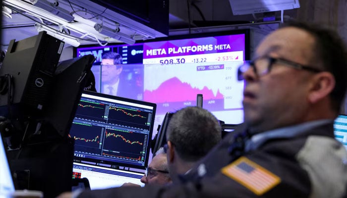Traders work on the floor at the New York Stock Exchange (NYSE) in New York City, US, April 16, 2025. — Reuters