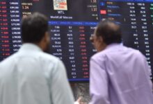 Stockbrokers monitor stock prices at the Pakistan Stock Exchange in Karachi on April 7, 2025. — INP
