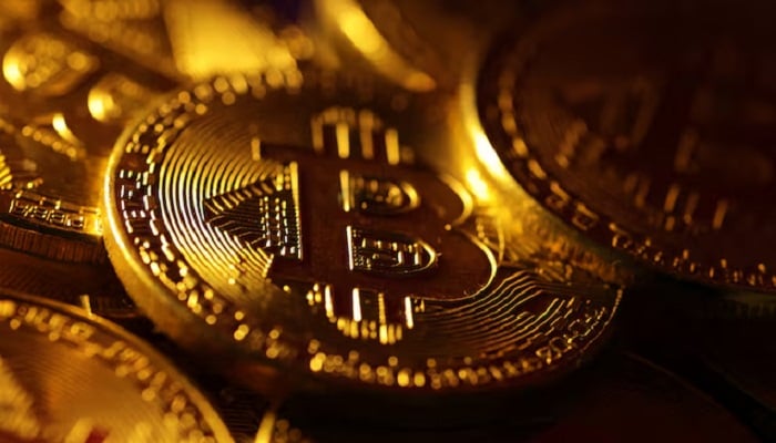 Physical representations of the bitcoin cryptocurrency are seen in this illustration taken October 24, 2023.— Reuters