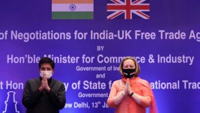 Indias Minister of Commerce and Industry, Piyush Goyal, and British Secretary of State for International Trade Anne-Marie Trevelyan pose for a picture during the launch of free trade agreement (FTA) negotiations between the United Kingdom and India during an event at a hotel in New Delhi, India, January 13, 2022. — Reuters