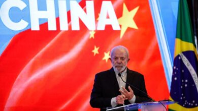 China, US sign duelling deals after agreeing to trade war truce