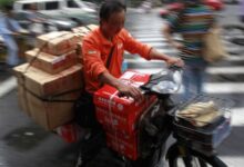 A Chinese rider is on his way to deliver online orders. — Reuters/File