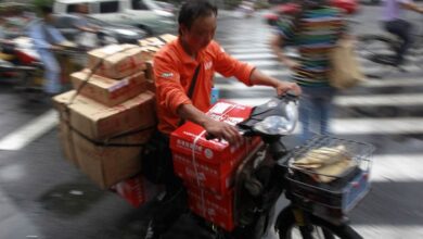 A Chinese rider is on his way to deliver online orders. — Reuters/File