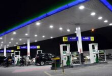 Consumers buy fuel at a petrol station. —APP/File