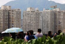 People at a shopping centre in Kai Tak with the public housing estate in the background on April 24, 2025. Photo: Jelly Tse