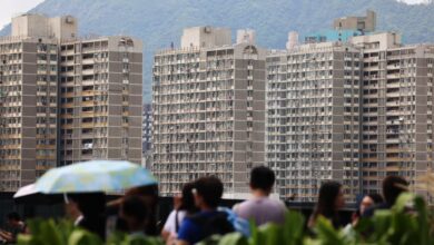 People at a shopping centre in Kai Tak with the public housing estate in the background on April 24, 2025. Photo: Jelly Tse