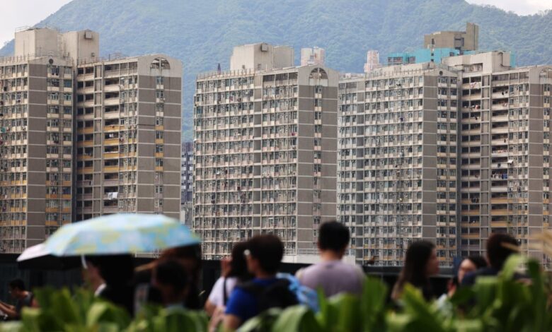 People at a shopping centre in Kai Tak with the public housing estate in the background on April 24, 2025. Photo: Jelly Tse