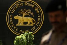 A police officer walks past the Reserve Bank of India (RBI) logo inside its headquarters in Mumbai, India, April 6, 2023. — Reuters