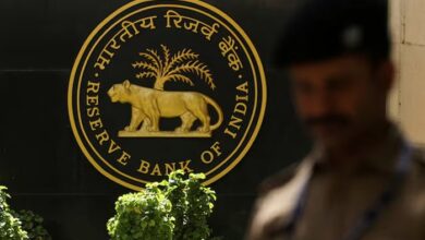 A police officer walks past the Reserve Bank of India (RBI) logo inside its headquarters in Mumbai, India, April 6, 2023. — Reuters