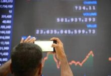 Stockbrokers monitor stock prices at the Pakistan Stock Exchange in Karachi on April 7, 2025. — INP