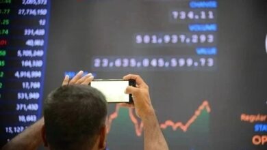 Stockbrokers monitor stock prices at the Pakistan Stock Exchange in Karachi on April 7, 2025. — INP