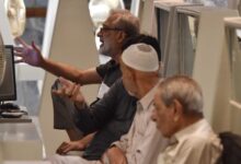 Stockbrokers monitor stock prices at the Pakistan Stock Exchange (PSX) in Karachi, April 7, 2025. — INP