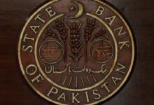 The logo of the State Bank of Pakistan is pictured on a reception desk at the banks head office in Karachi, Pakistan, July 16, 2019.— Reuters