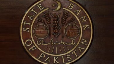 The logo of the State Bank of Pakistan is pictured on a reception desk at the banks head office in Karachi, Pakistan, July 16, 2019.— Reuters