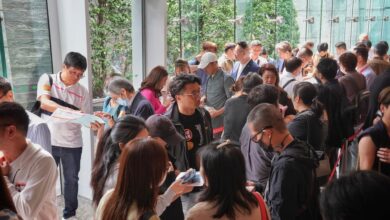 Potential buyers queue up to buy flats in Sun Hung Kai Properties’ Sierra Sea residential project at the International Commerce Centre on May 3. Photo: Elson Li