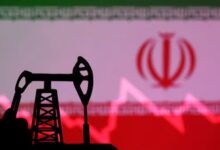 Iranian flag with stock graph and an oil pump jack miniature model are seen in this illustration taken October 9, 2023. — Reuters
