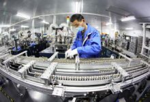 An employee works on a lithium battery production line at a factory in Huaibei, Anhui province, China, in April. Photo: AFP