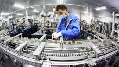 An employee works on a lithium battery production line at a factory in Huaibei, Anhui province, China, in April. Photo: AFP