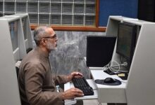 Stockbroker monitors share prices during a trading session at the Pakistan Stock Exchange (PSX) in Karachi, January 21, 2025. — INP