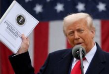 US President Donald Trump holds a Foreign Trade Barriers document as he delivers remarks on tariffs in the Rose Garden at the White House, Washington, US, April 2, 2025. — Reuters